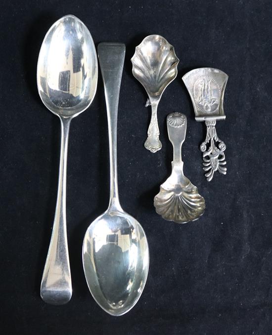 Three silver caddy spoons including one Newcastle and a pair of tablespoons